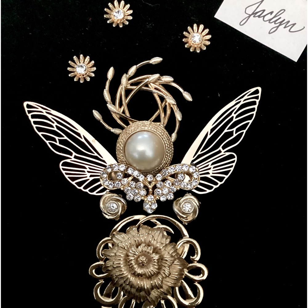 Angel Jaclyn is made out of broken down jewelry on Black velvet